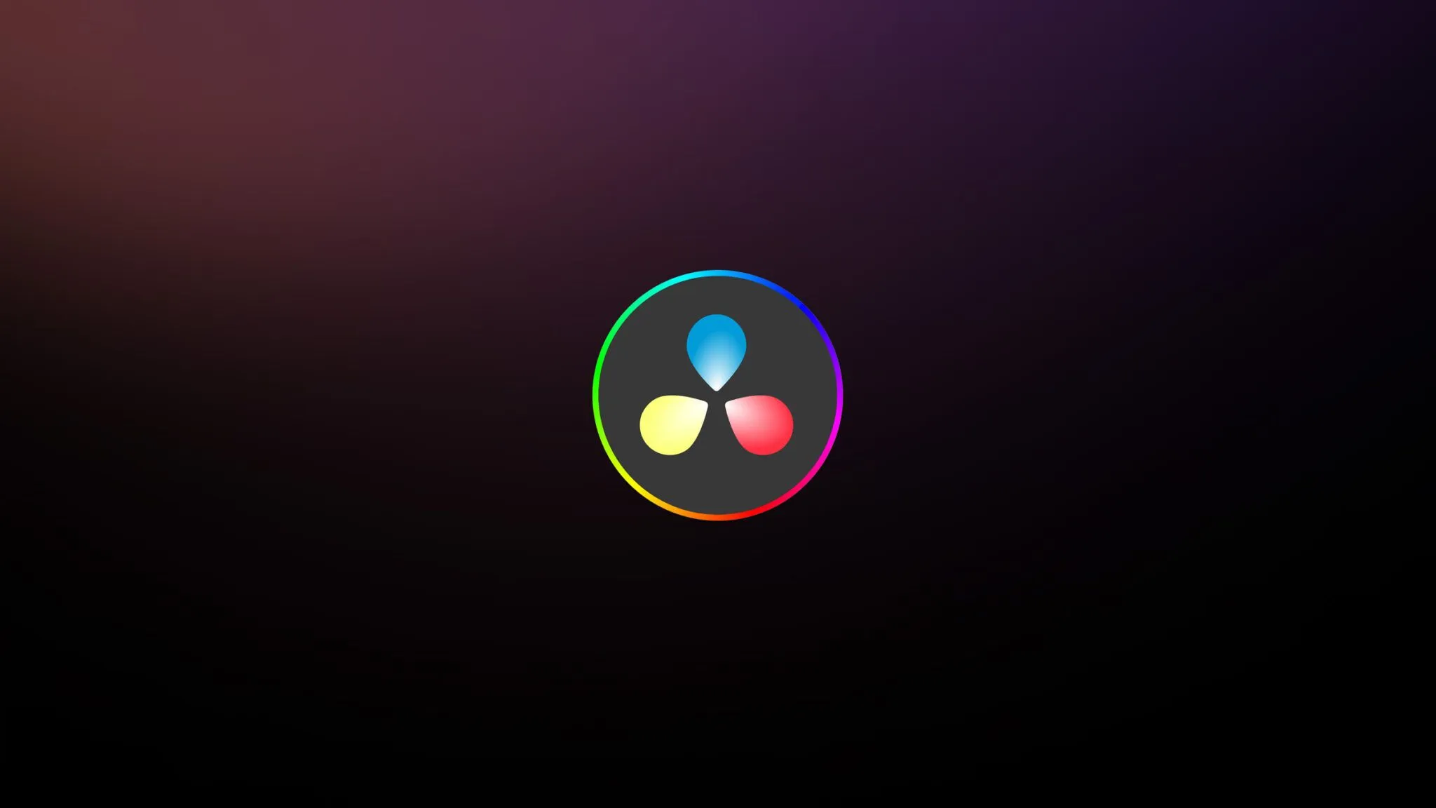 Logo di Davinci resolve, un programma di montaggio video caratterizzato da tre gocce dei tre colori fondamentali (Magenta, Cyan, Ciano) e un cerchio che li racchiude con i colori (In un arcobaleno RGB)
